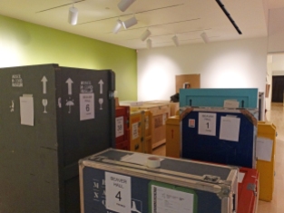 Art crates adjusting to the climate space before being unpacked.
